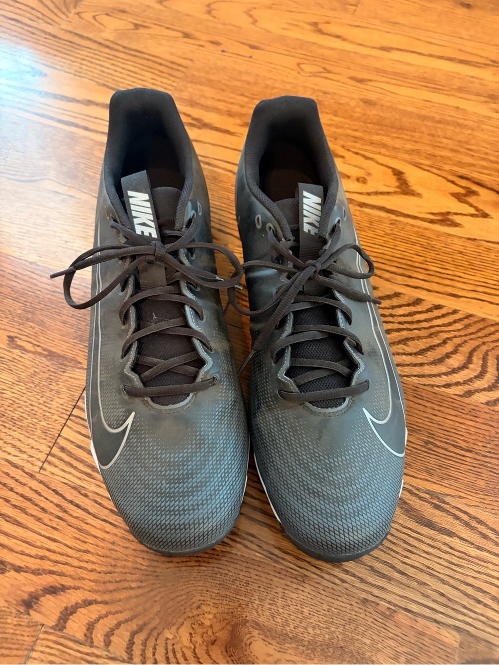 Nike Men’s Black Athletic Running Shoes with White Swoosh